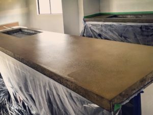 Like polished concrete floors, concrete countertops can be polished to a matt, satin or high gloss finish.